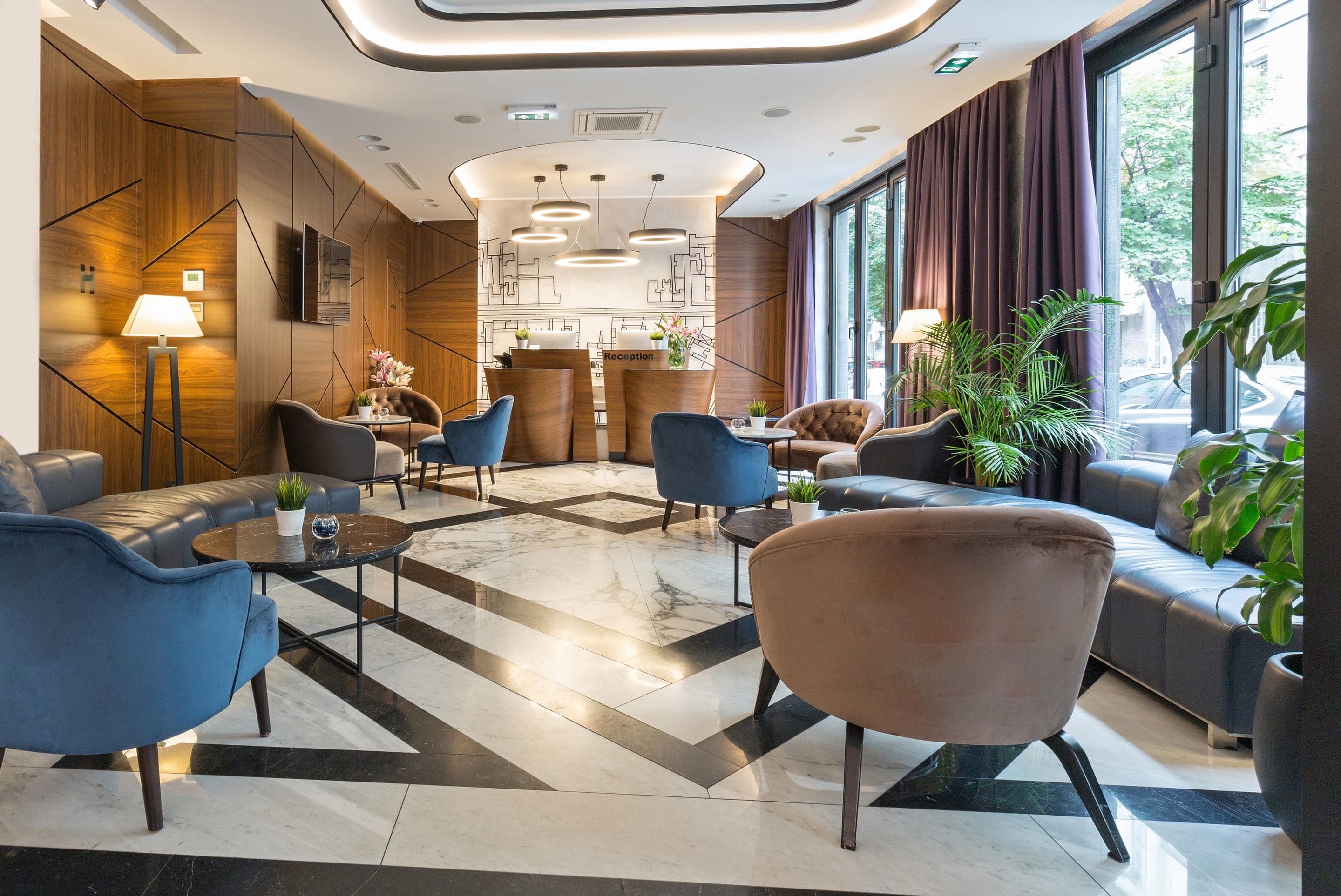 A warm, marble-floored Segal lobby curated to the last detail